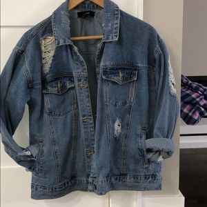 Distressed Denim Jacket.